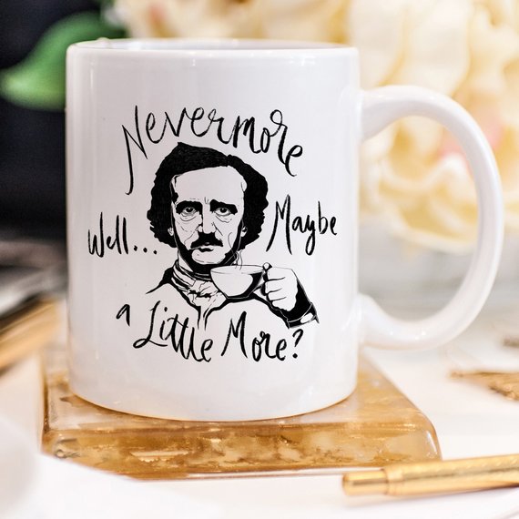 A high-quality 11 oz ceramic coffee mug featuring the phrase 'Nevermore' in a stylish design, perfect for Edgar Allan Poe fans.