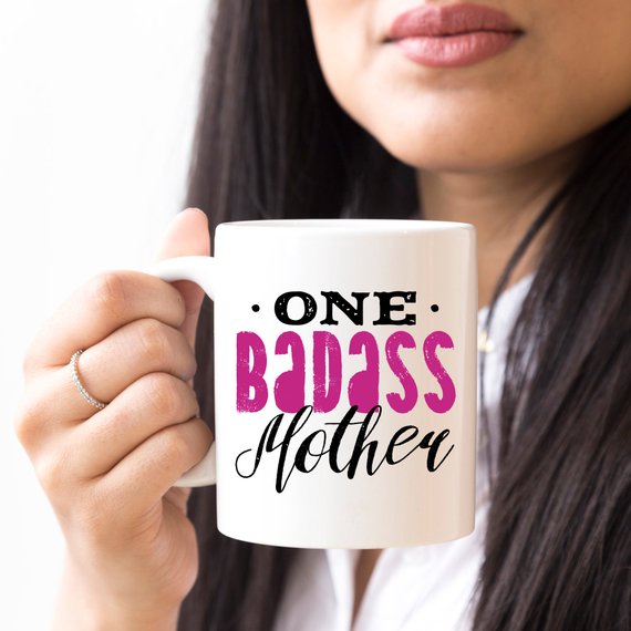 One Badass Mother funny coffee mug with a humorous design, perfect for Mother's Day gifts.