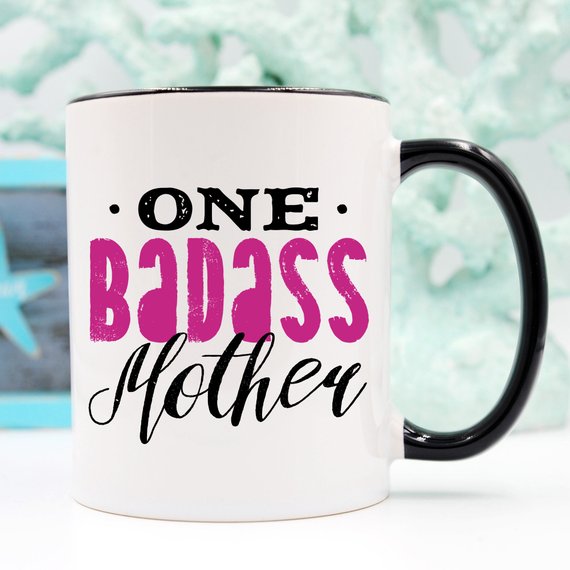 One Badass Mother funny coffee mug with a humorous design, perfect for Mother's Day gifts.