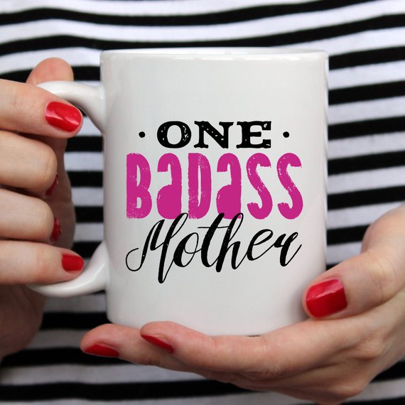 One Badass Mother funny coffee mug with a humorous design, perfect for Mother's Day gifts.