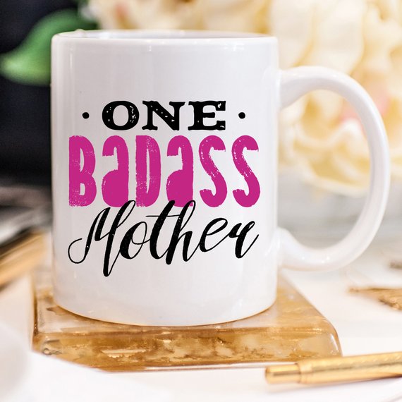 One Badass Mother funny coffee mug with a humorous design, perfect for Mother's Day gifts.