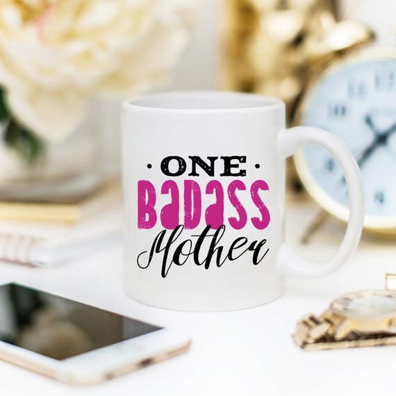 One Badass Mother funny coffee mug with a humorous design, perfect for Mother's Day gifts.