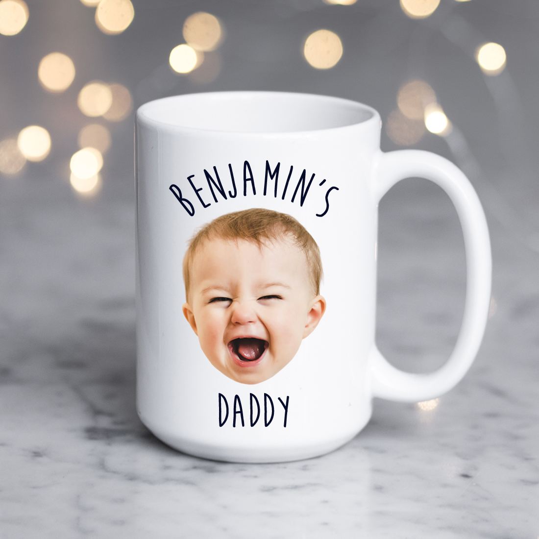 A personalized photo mug featuring a custom image and text, showcasing a glossy white ceramic finish.