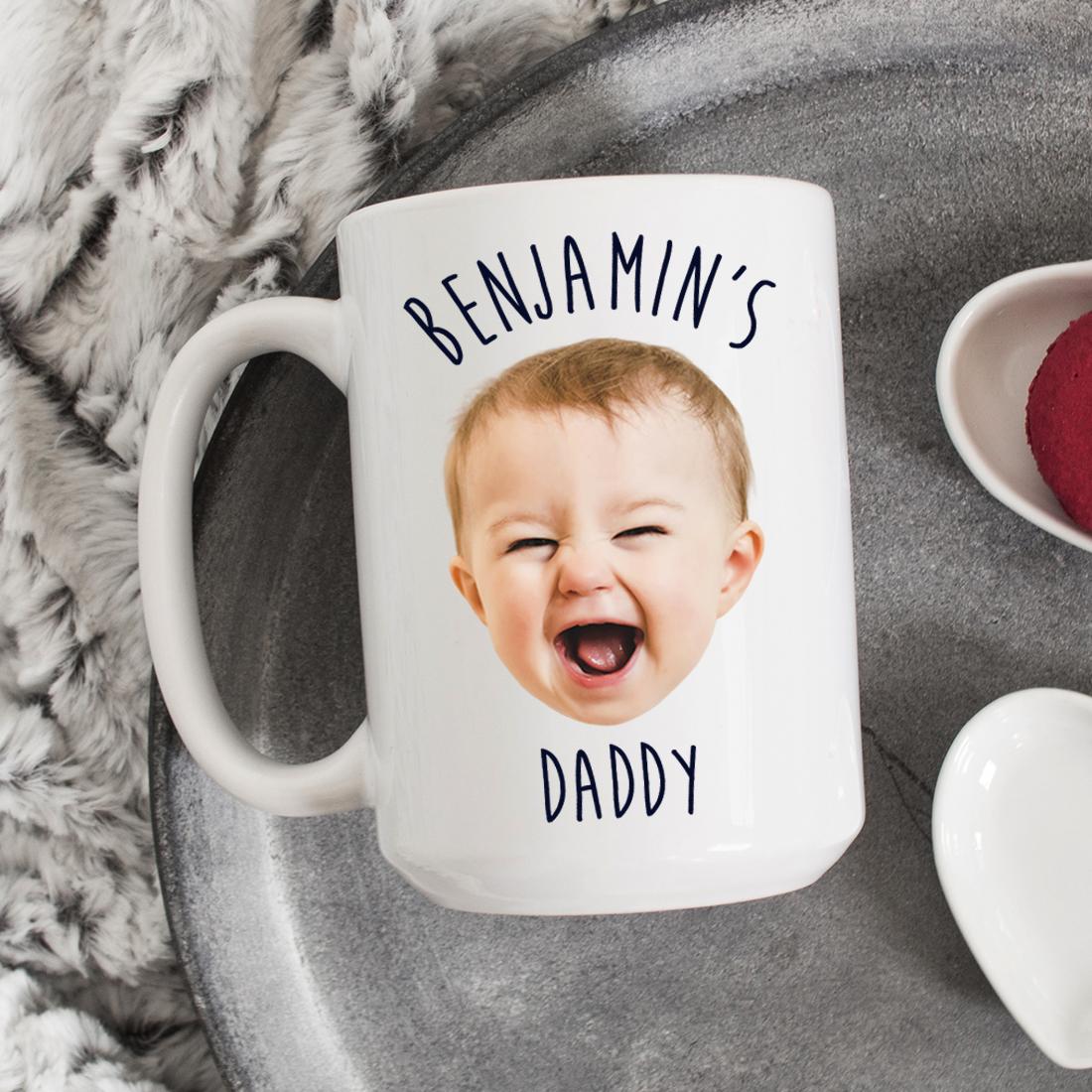 A personalized photo mug featuring a custom design with a vibrant image and text, showcasing its glossy white ceramic finish.