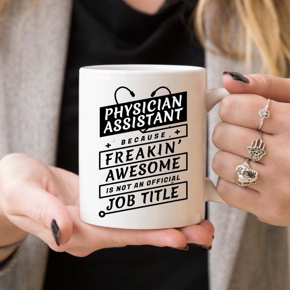 A humorous coffee mug for Physician Assistants featuring the phrase 'Physician Assistant Because Freakin' Awesome Is Not An Official Job Title.'