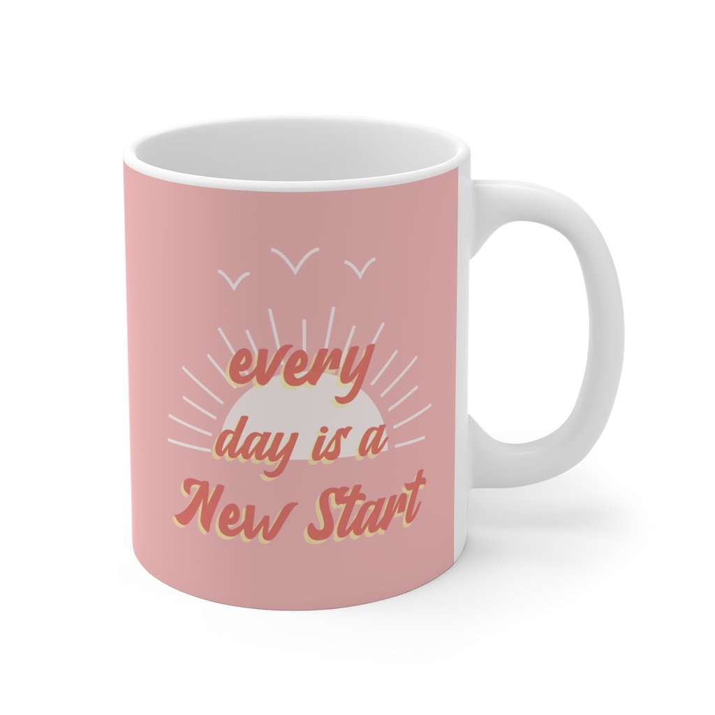 A pink ceramic mug with the phrase 'Everyday Is A New Start' printed on it, featuring rounded corners and a comfortable C-Handle.