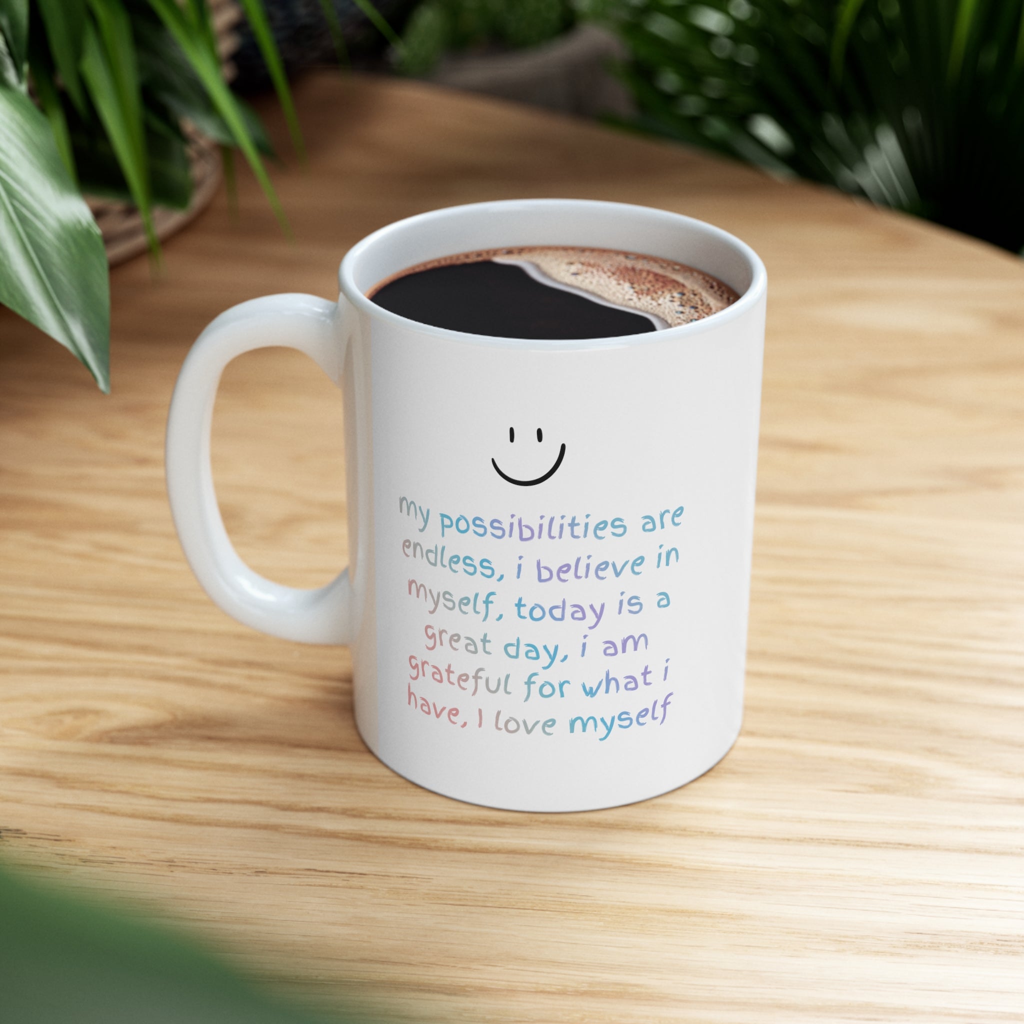 A white ceramic mug with positive affirmations, perfect for coffee or tea, featuring rounded corners and a classic design.