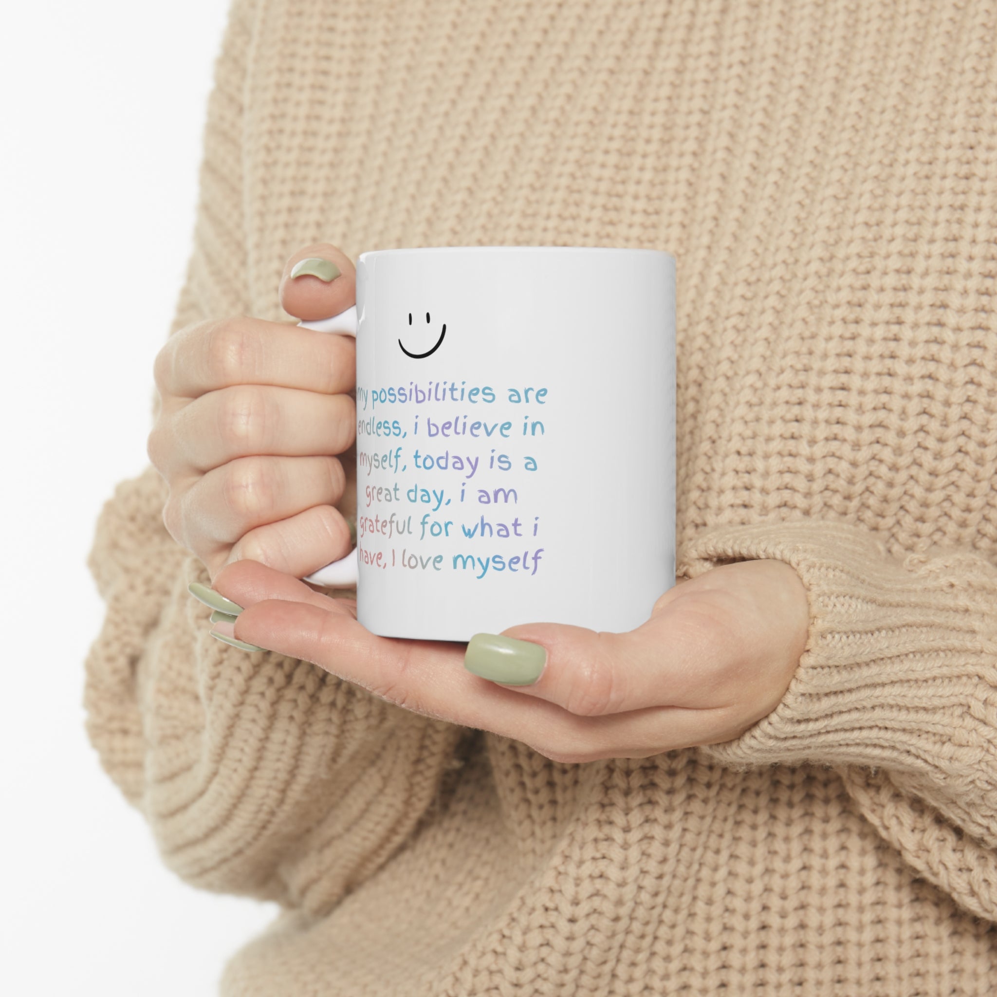 A white ceramic mug with positive affirmations, perfect for coffee or tea, featuring rounded corners and a classic design.