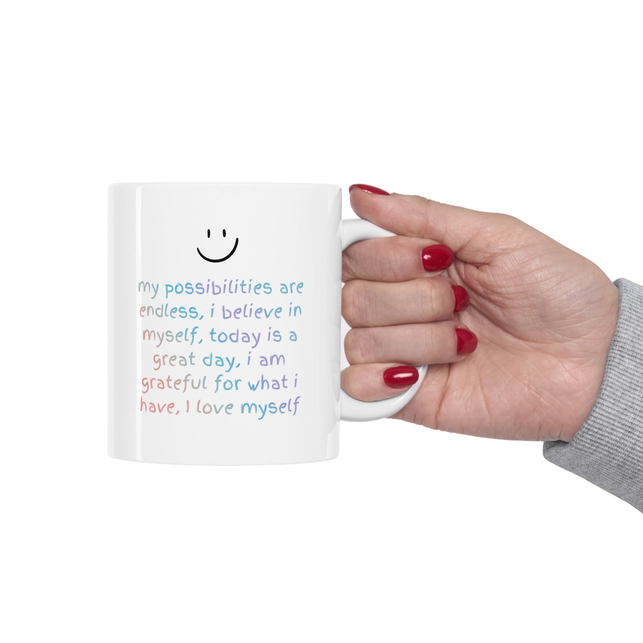 A white ceramic mug with positive affirmations, perfect for coffee or tea, featuring rounded corners and a classic design.