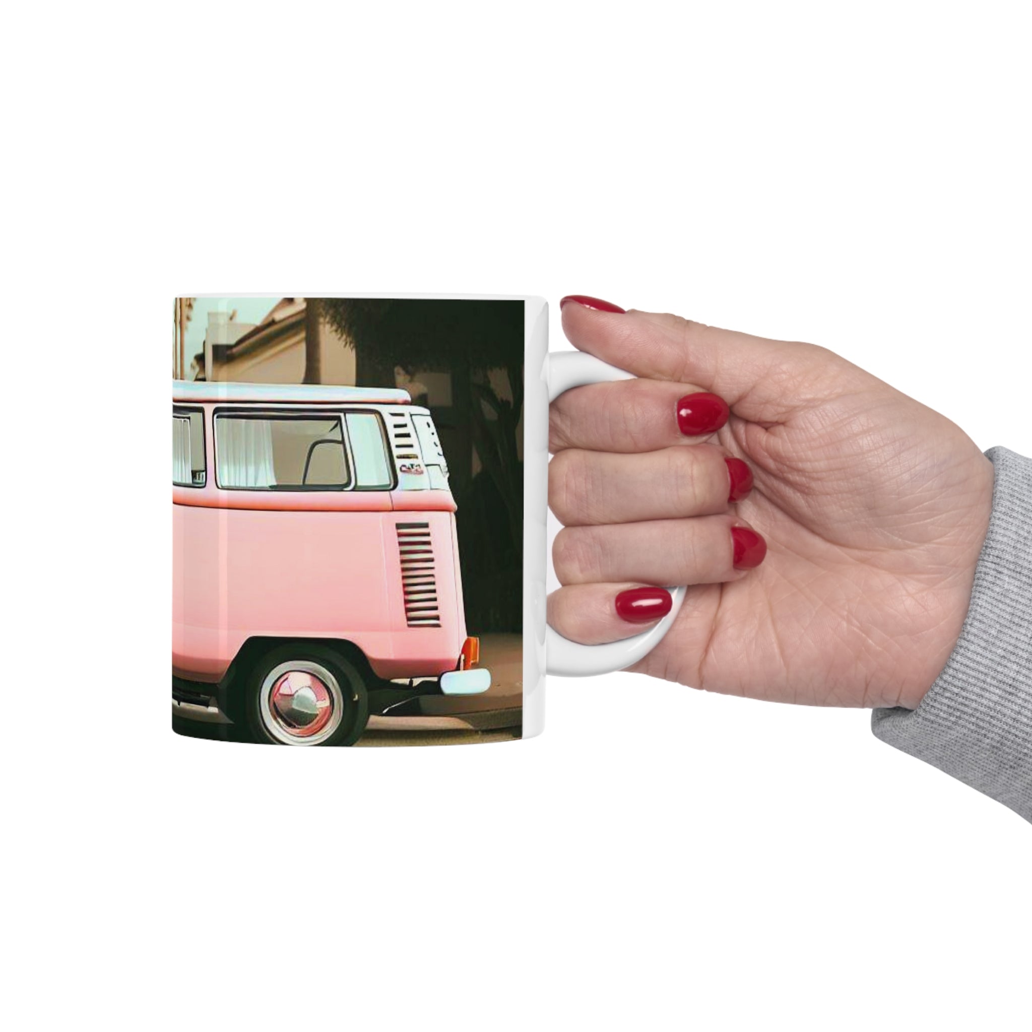 A stylish Retro Pink Van Coffee Tea Mug featuring a vintage pink van design, perfect for enjoying hot beverages.