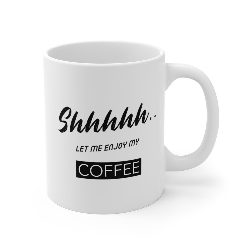 Shhh...Let Me Enjoy My Coffee Mug, a white ceramic mug with rounded corners and a comfortable C-handle, perfect for coffee, tea, and hot chocolate.