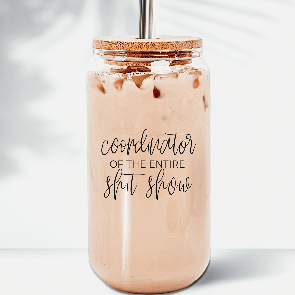 S**t Show Coordinator Set featuring glass cups with bamboo lids and stainless steel straws, perfect for various beverages.