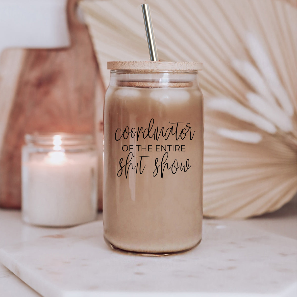 S**t Show Coordinator Set featuring glass cups with bamboo lids and stainless steel straws, perfect for various beverages.