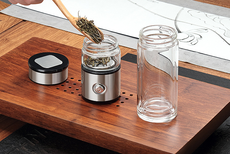 Stainless Steel Thermo Cup with tea-water separation design, showcasing its sleek and modern appearance.