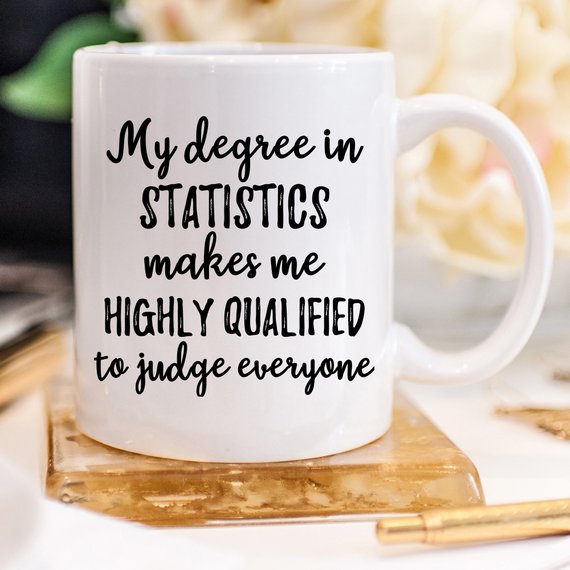 A white ceramic Statistics Mug featuring vibrant designs on both sides, perfect for statisticians and data enthusiasts.