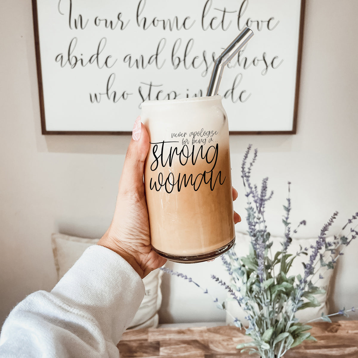 Strong Woman Set featuring glass drinking cups with bamboo lids and stainless steel straws, showcasing a stylish black graphic design.