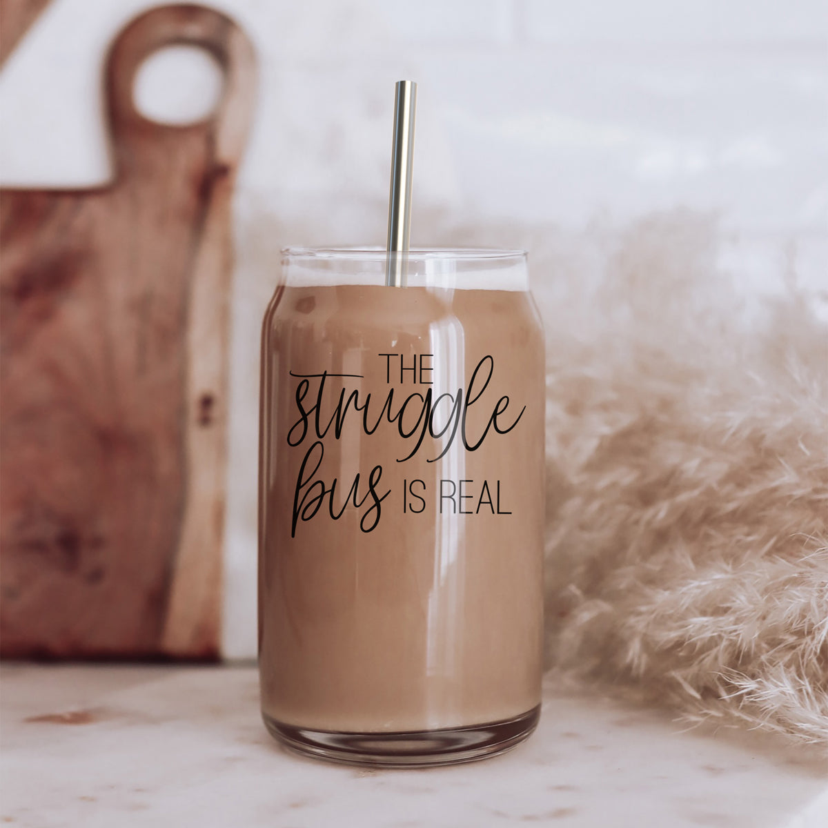 Struggle Bus Set featuring glass drinking cups with bamboo lids and stainless steel straws, ideal for various beverages.