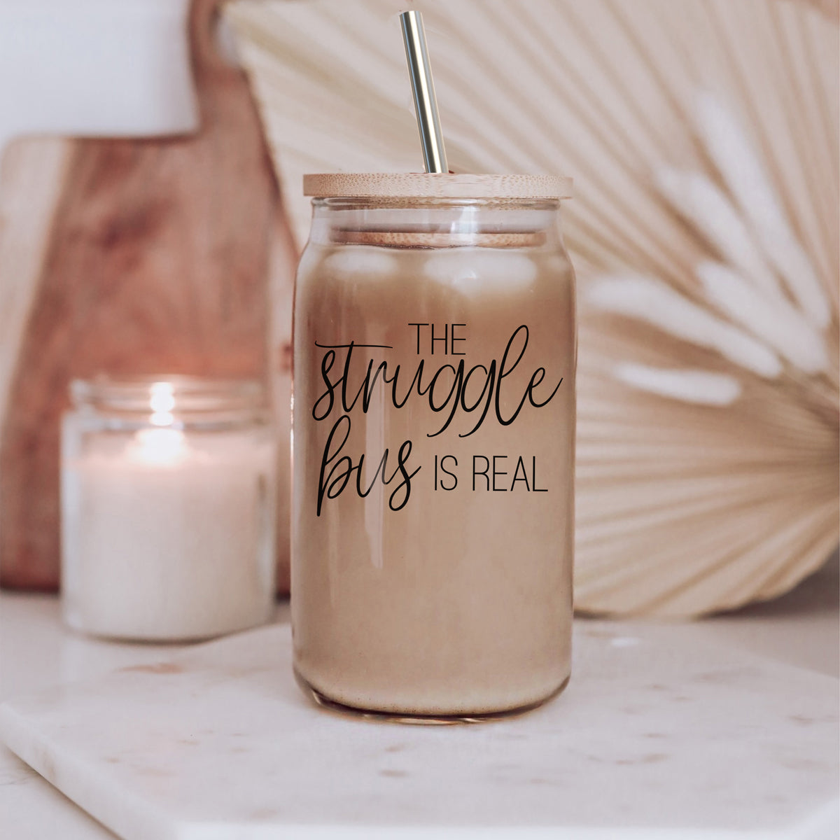 Struggle Bus Set featuring glass drinking cups with bamboo lids and stainless steel straws, ideal for various beverages.