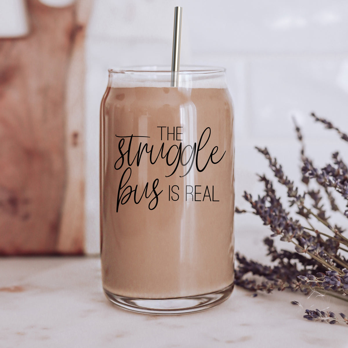 Struggle Bus Set featuring glass drinking cups with bamboo lids and stainless steel straws, ideal for various beverages.