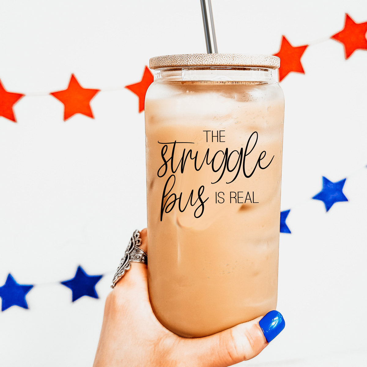 Struggle Bus Set featuring glass drinking cups with bamboo lids and stainless steel straws, ideal for various beverages.