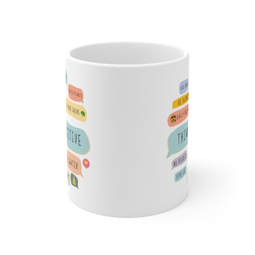 A white ceramic mug featuring positive quotes, perfect for coffee and tea lovers, showcasing its durable design and 11-ounce capacity.