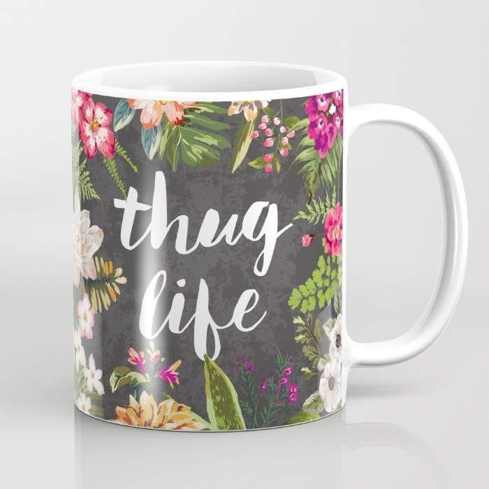 White mug with floral design.