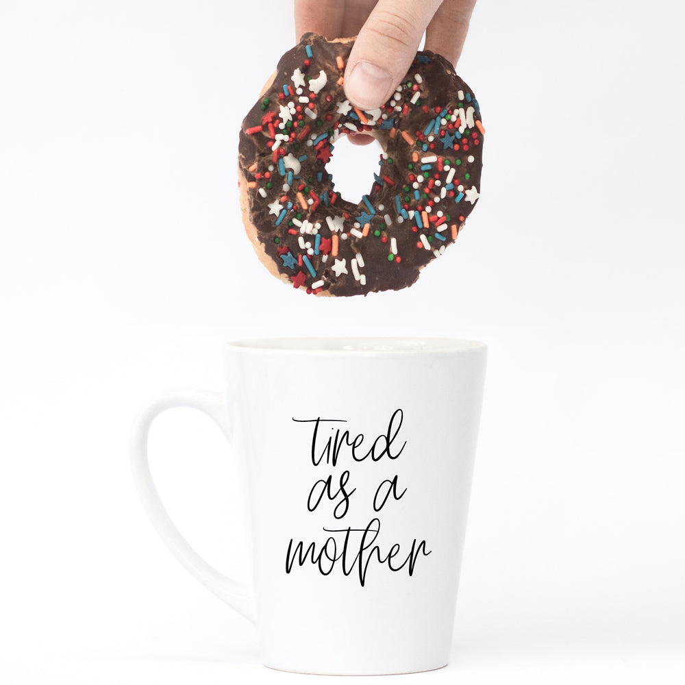 Tired as a Mother Grande mug in navy blue and white, featuring double-sided design with humorous text, perfect for mothers.