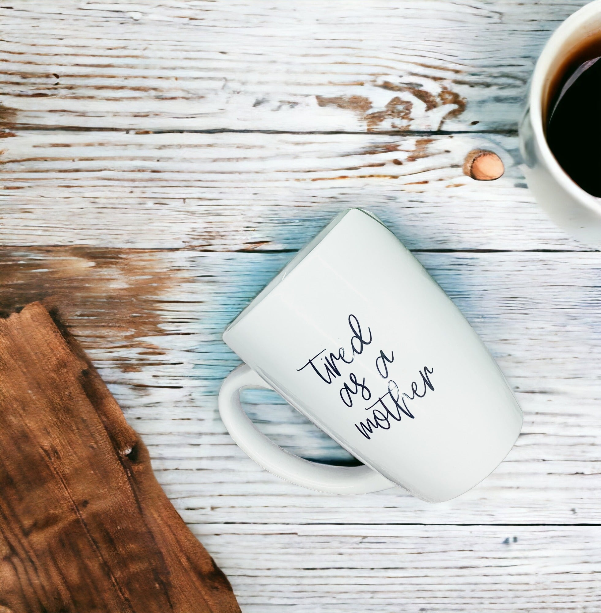 Tired as a Mother Grande mug in navy blue and white, featuring double-sided design with humorous text, perfect for mothers.