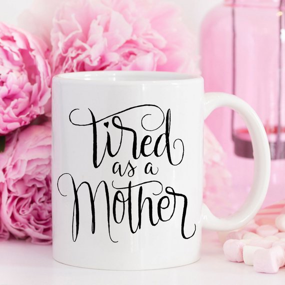 Tired As A Mother funny coffee mug, 11oz ceramic with humorous design, perfect for Mother's Day gifts.