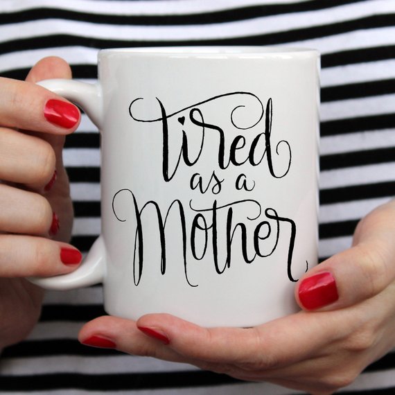 Tired As A Mother funny coffee mug, 11oz ceramic with humorous design, perfect for Mother's Day gifts.