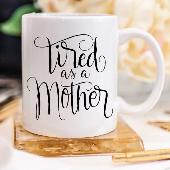 Tired As A Mother funny coffee mug, 11oz ceramic with humorous design, perfect for Mother's Day gifts.