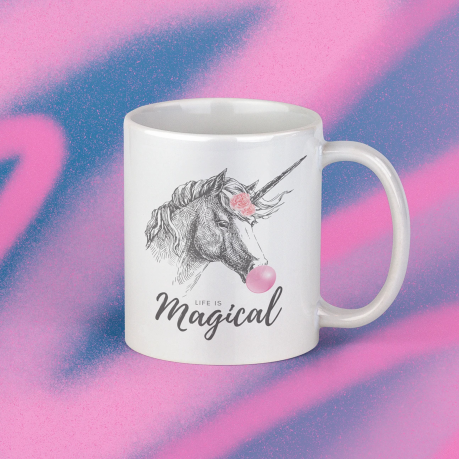 A whimsical Unicorn Bubble Gum Life is Magical Mug featuring a colorful unicorn design, perfect for coffee and tea lovers.