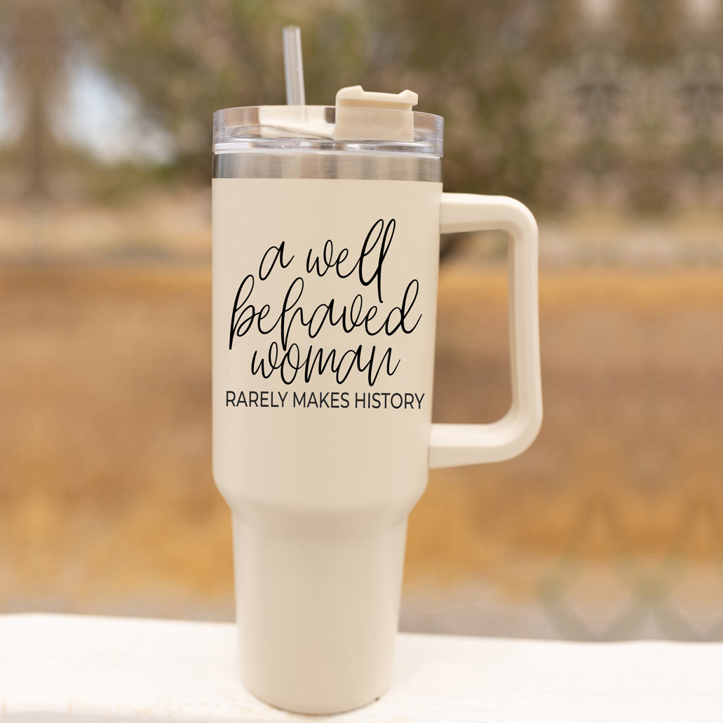 Well Behaved Woman 40oz insulated mug with a matte cream finish, featuring a black graphic design and a versatile 3-in-1 lid.