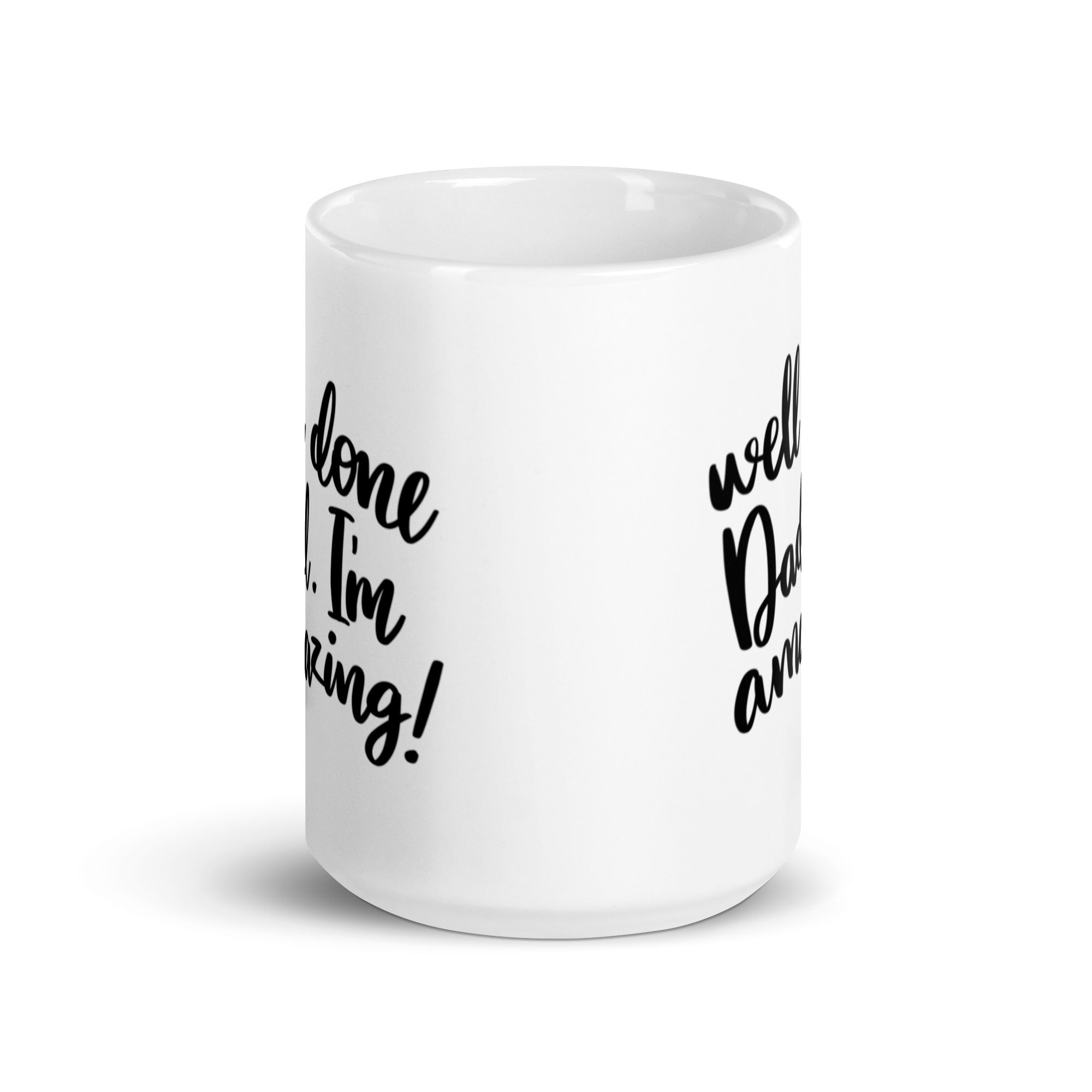 A glossy ceramic mug featuring the humorous text 'Well Done Dad I'm Amazing' printed on both sides, perfect for coffee or tea.