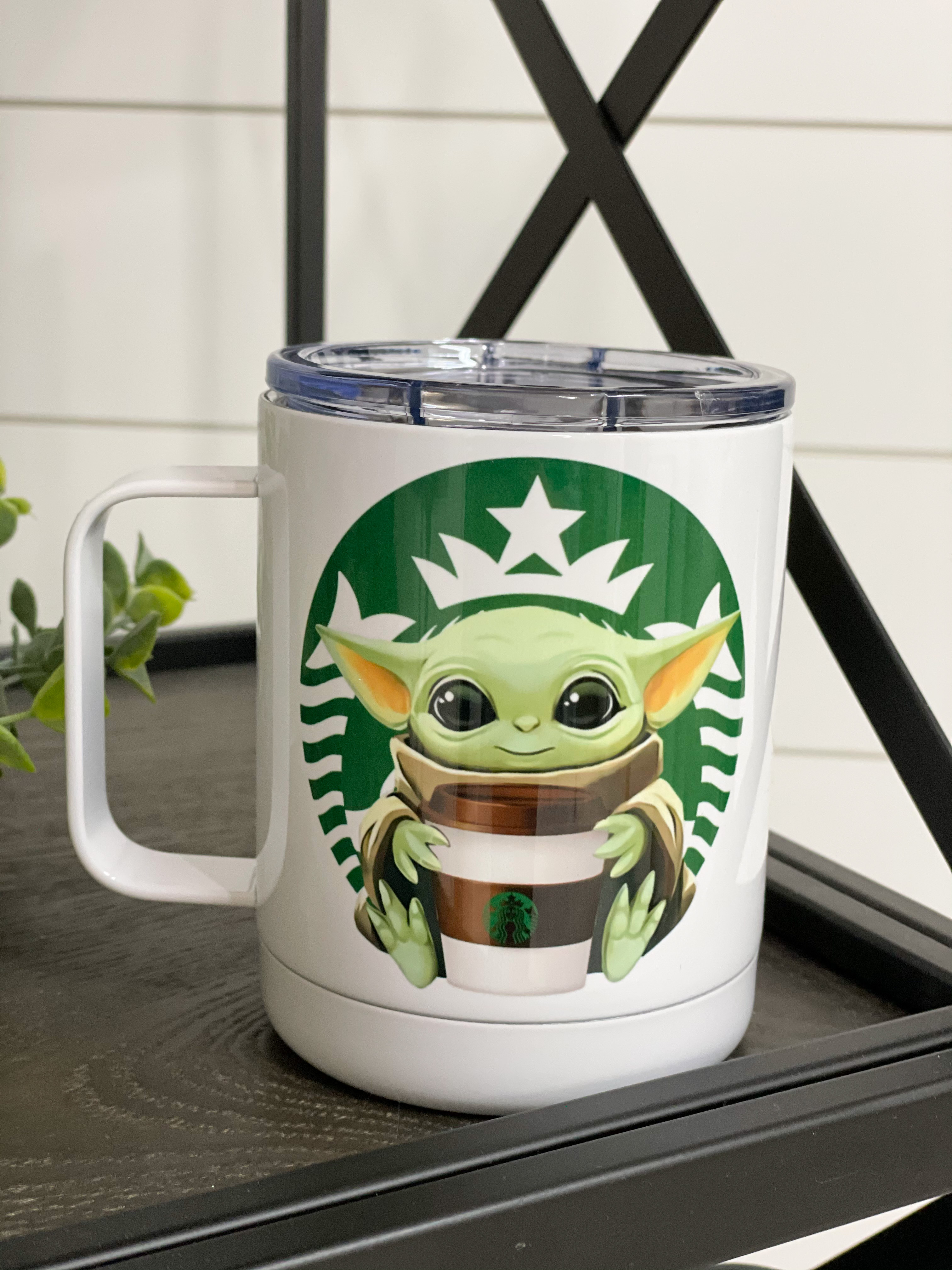 Yoda Starbucks 11oz Travel Mug featuring a double-sided design with Yoda's image, perfect for coffee lovers.