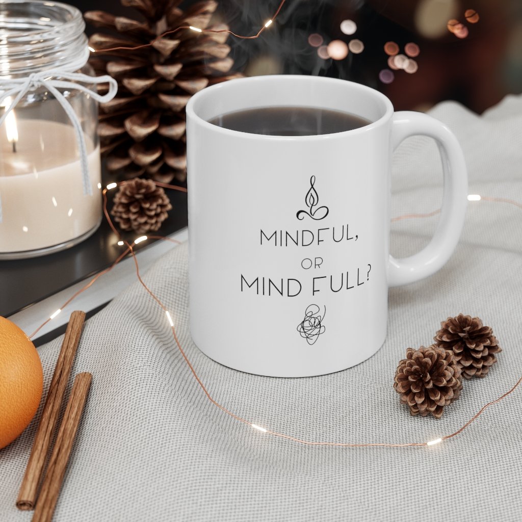 A white ceramic mug with the phrase 'Mindful or Mind Full' designed for yoga enthusiasts, featuring a C-Handle and rounded corners.