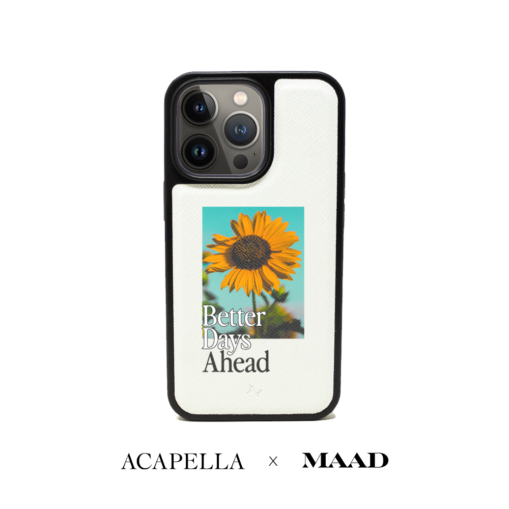 Acapella x MAAD Sunflower White Leather Case for iPhone 14 Pro, featuring vegan saffiano leather and a soft rubber rim.