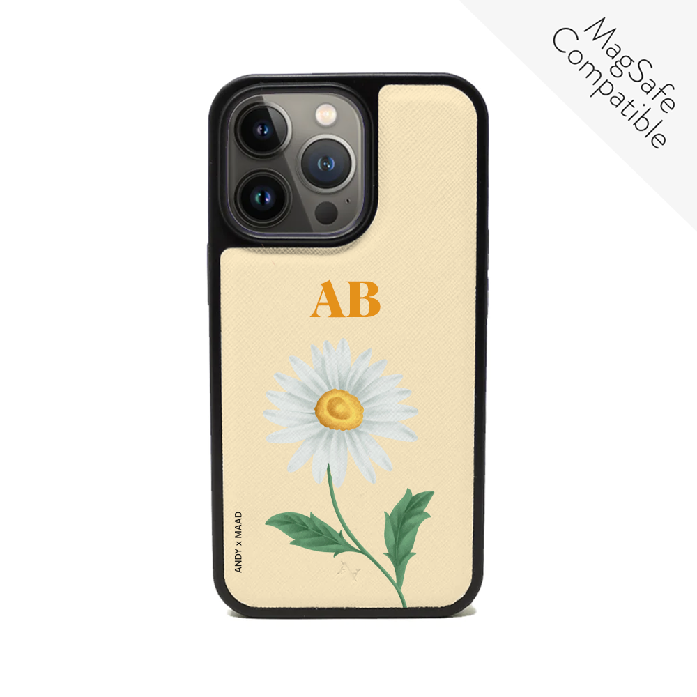 ANDY X MAAD Yellow Daisy Leather Case for iPhone 14 Pro, featuring vegan saffiano leather and a soft rubber rim.