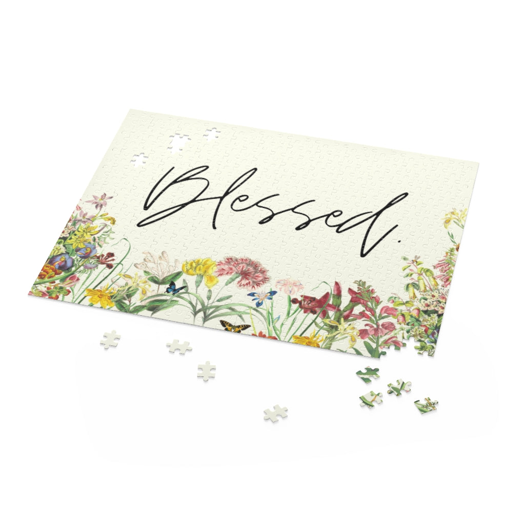 A beautifully designed 500-piece jigsaw puzzle featuring a floral pattern and an inspirational quote, packaged in a gift-ready box.