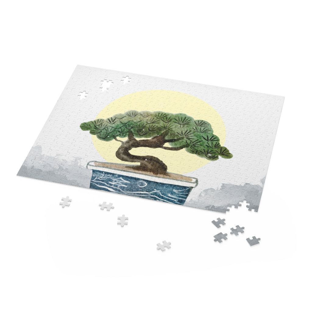 A beautifully designed 500-piece jigsaw puzzle featuring a serene bonsai tree, showcasing vibrant colors and a glossy finish.