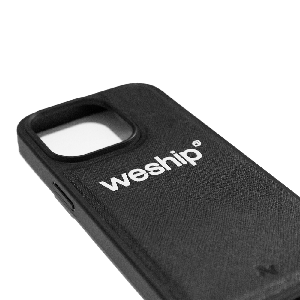 Black vegan saffiano leather case for iPhone 14 Pro with soft rubber rim, showcasing personalization options.