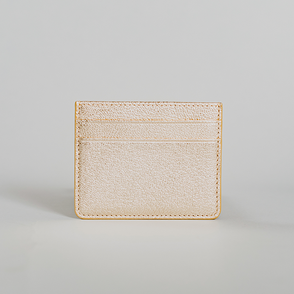 Gold Metallic Pebble Card Holder made from leather with suede detailing, featuring five card slots and personalization options.