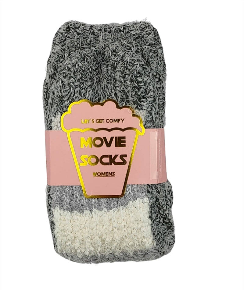 Grey and white movie socks displayed on a soft surface, showcasing their stylish design and comfortable fabric.