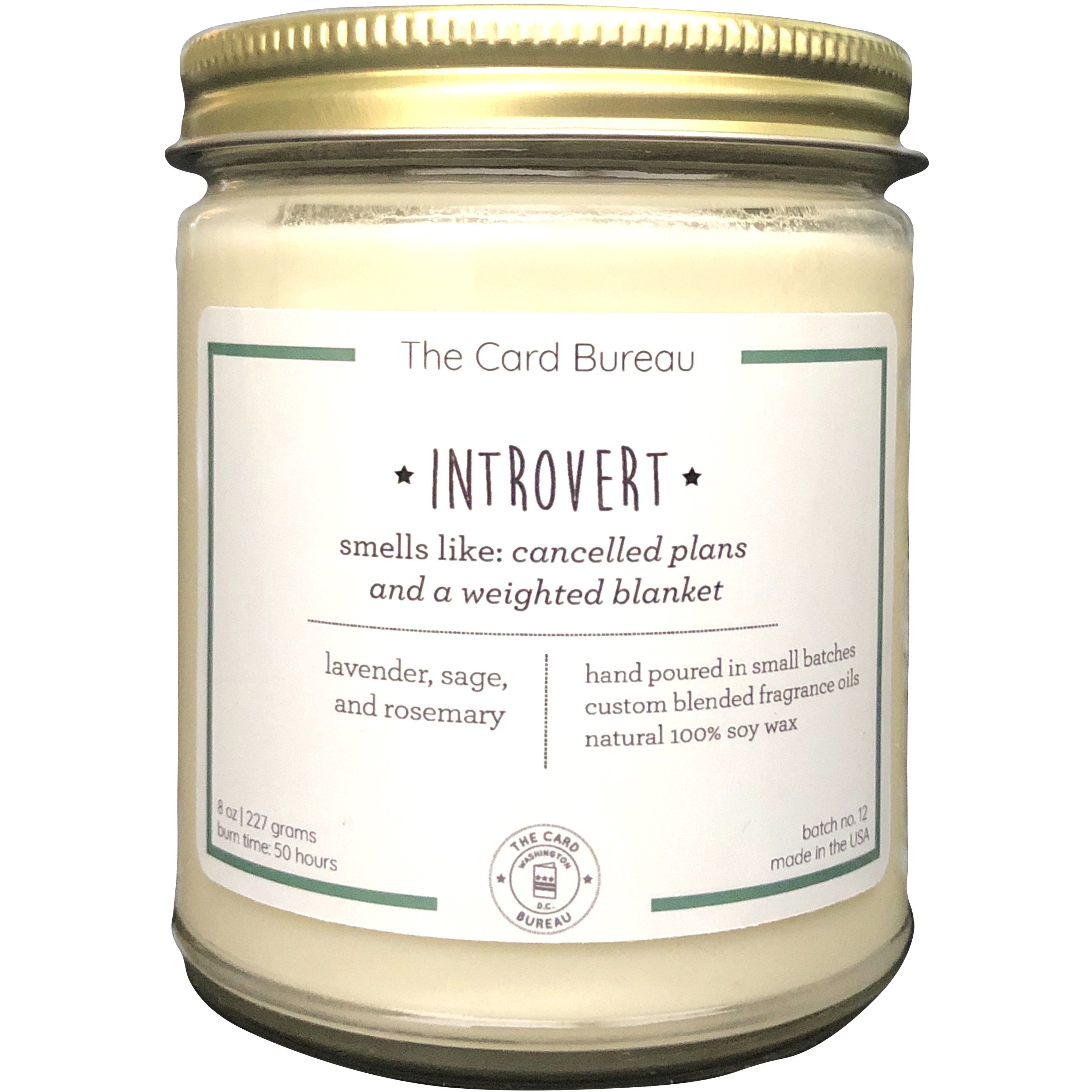 A beautifully hand-poured Introvert Candle in a glass jar, featuring a soothing lavender, sage, and rosemary scent, perfect for creating a cozy atmosphere.