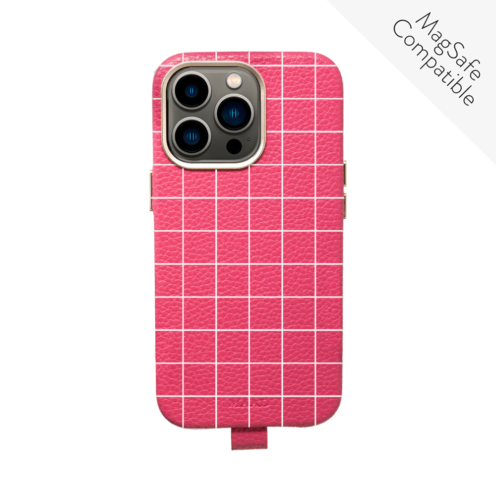 MAAD Full Wrapped Hot Pink Grid iPhone 13 Pro case featuring vegan leather and gold pleated edges, showcasing a trendy design.