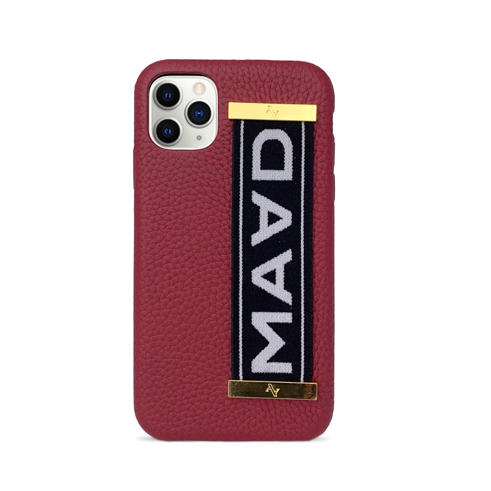 MAAD LVR Red iPhone 11 Pro Case made of genuine pebble leather with an elastic strap for secure carrying.