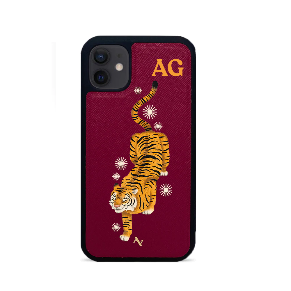 MAAD Tiger Red Leather Case for iPhone 12, featuring saffiano leather and soft rubber rim for protection.