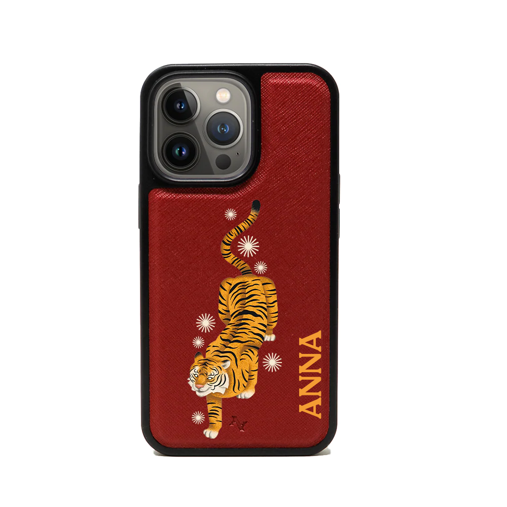 MAAD Tiger Red Leather Case for iPhone 13 Pro, featuring vegan saffiano leather and a soft rubber rim for protection.