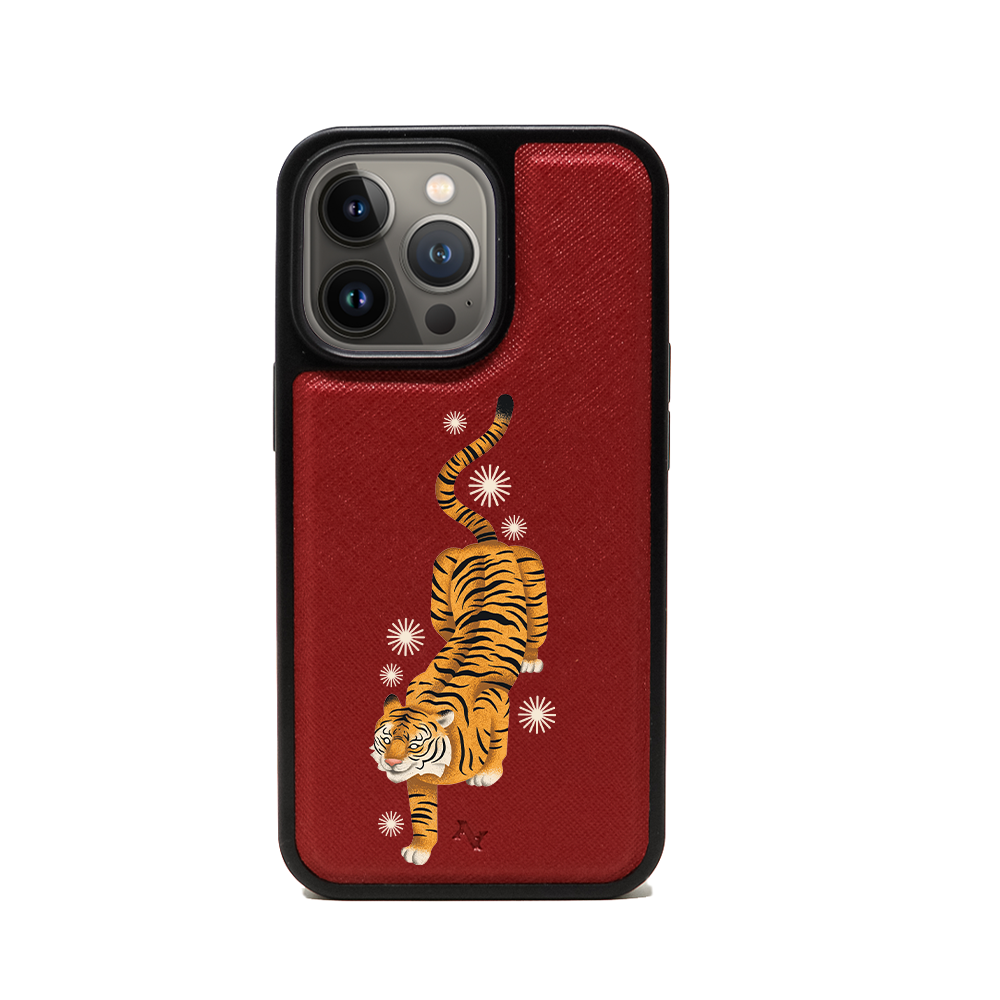 MAAD Tiger Red Leather Case for iPhone 13 Pro, featuring vegan saffiano leather and a soft rubber rim for protection.