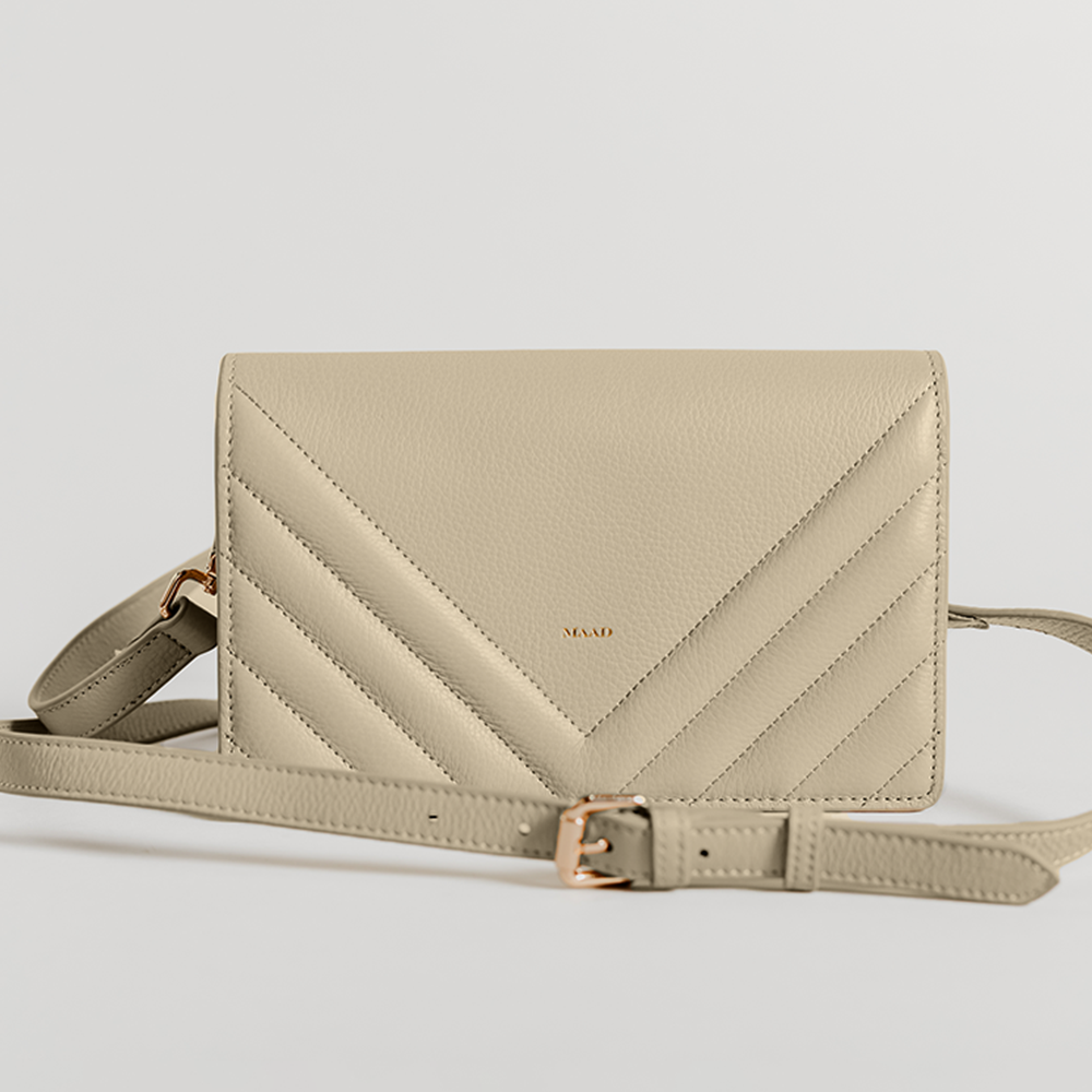 Match Grey Quilted Crossbody bag made of smooth pebble leather with an adjustable strap and interior cardholder.